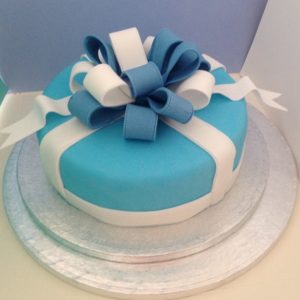 Blue and white bow cake