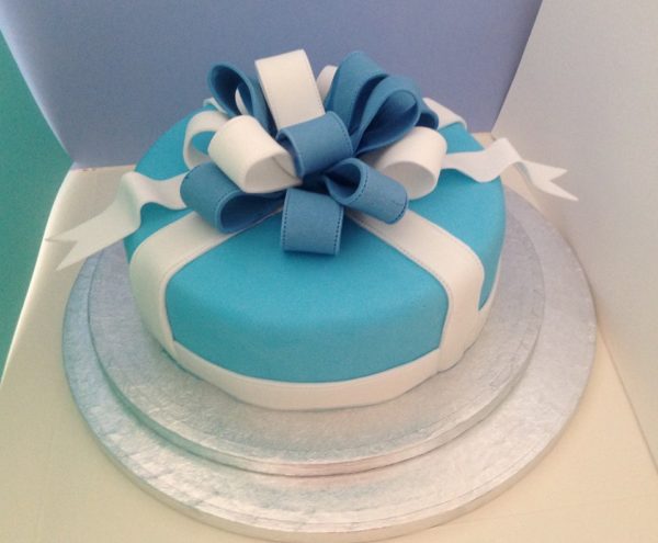 Blue and white bow cake