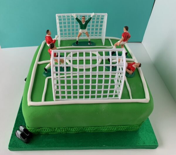 Football cake 8 inches behind goal